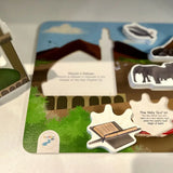 Educational children's puzzle for Shia Muslim Kids with cut-out pieces and illustrations on a flat surface