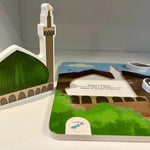 Educational toy puzzle by Kawthar kids with a mosque model and a book on a white surface