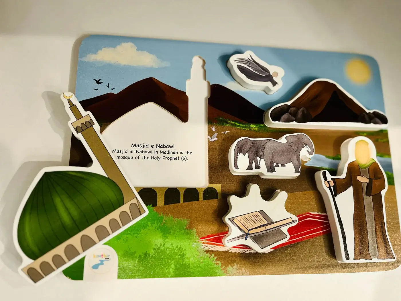 Educational Prophet Muhammad puzzle and landmarks on a wooden board by Kawthar Kids