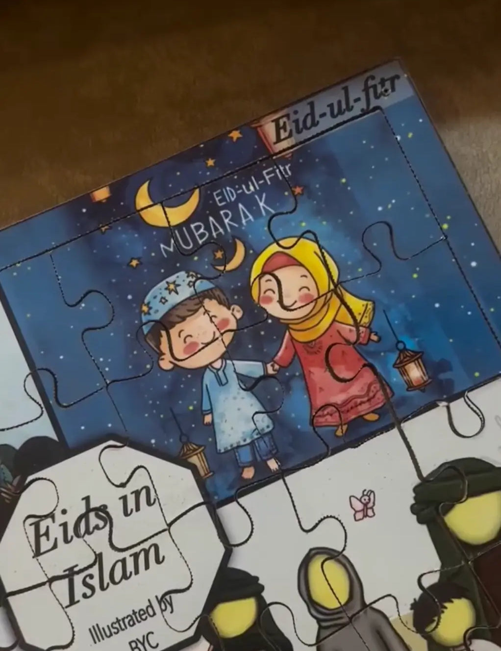 Eid-themed puzzle with cartoon characters and 'Eids in Islam' branding.