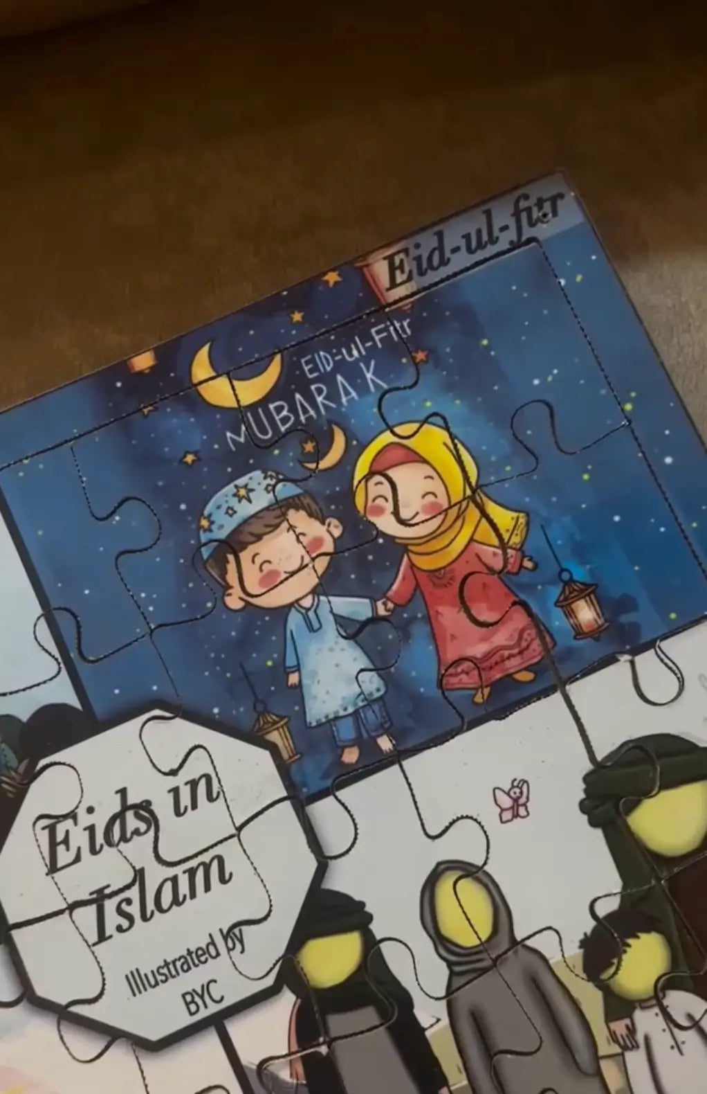 Eid-themed puzzle with cartoon characters and 'Eids in Islam' branding.