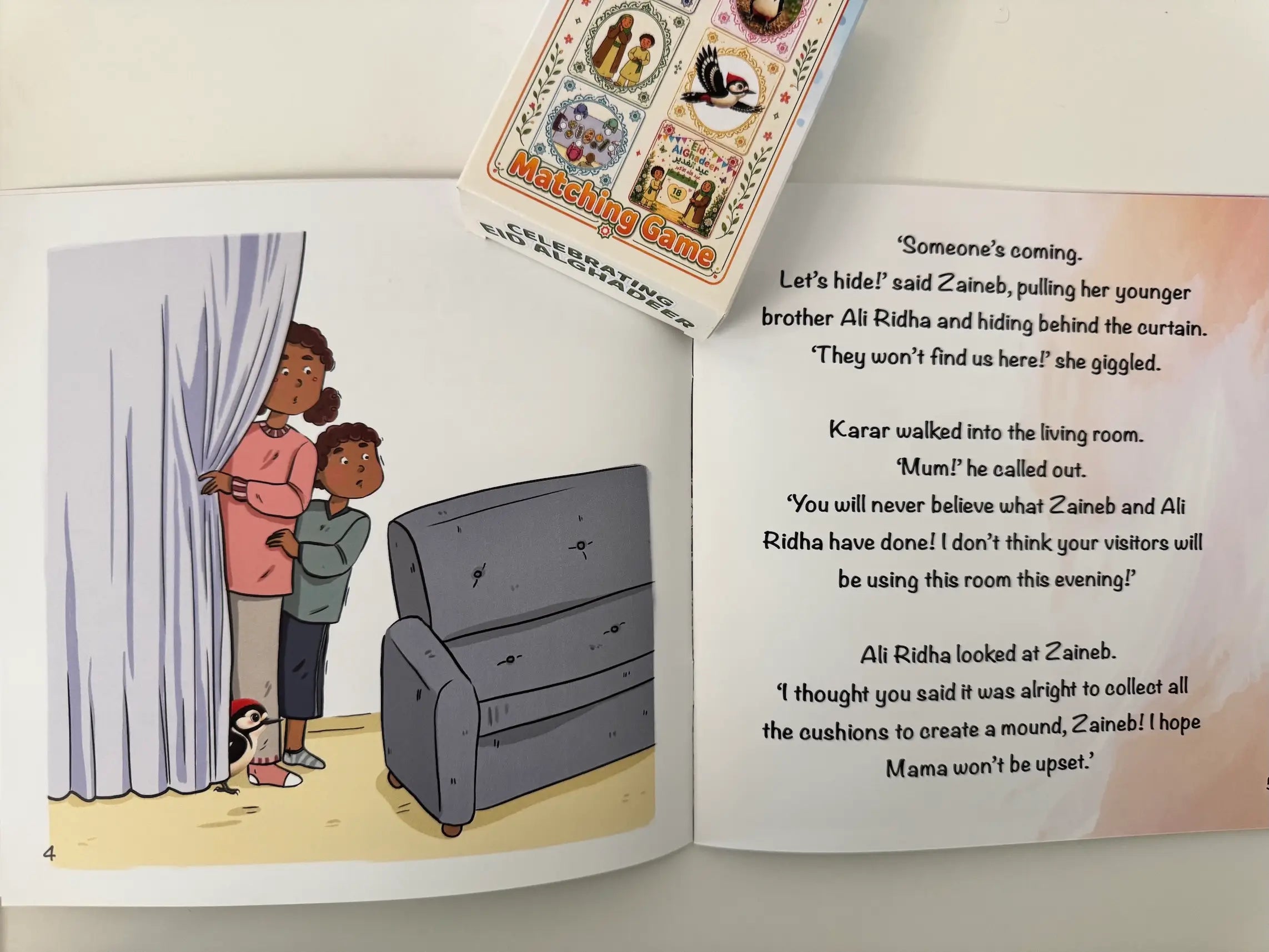 Open book with illustrations and text on a white background