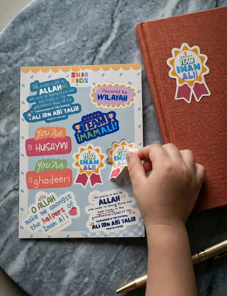 Sheet of colorful Eid al-Ghadir stickers, with a hand reaching for one of the stickers.