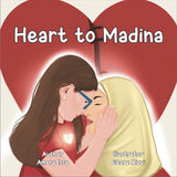 Book cover of 'Heart to Madina' with two women embracing in front of a large red heart. By Sanadi Publications written by Rola Fahs illustrations by Sitara Rizvi