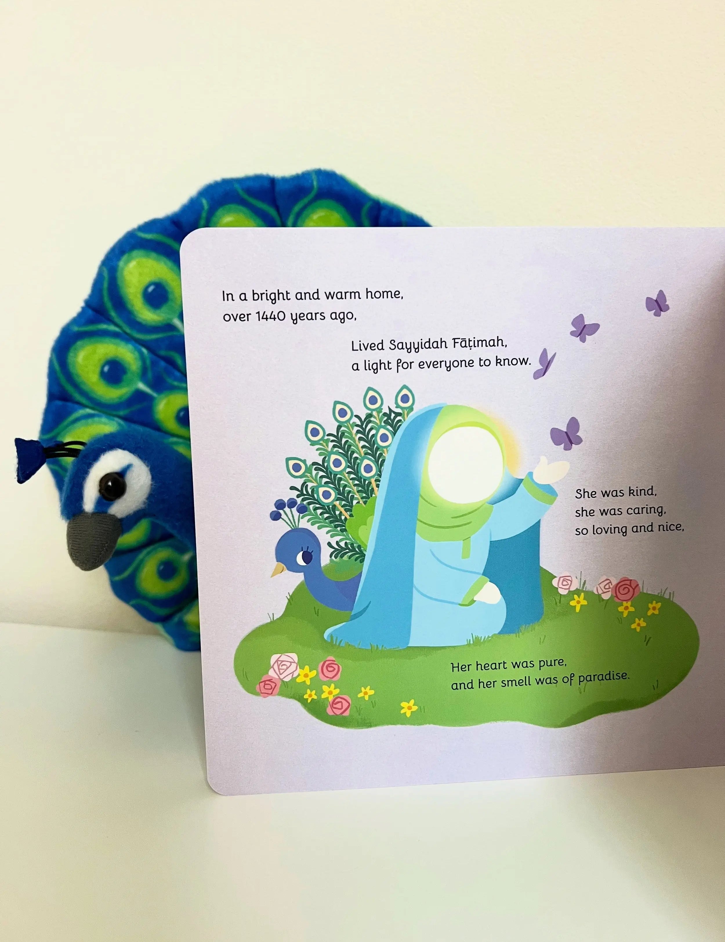 Children's book with a peacock character on a plain background