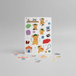 Sheet of Masjid Mouse colourful stickers with various illustrations on a gray background