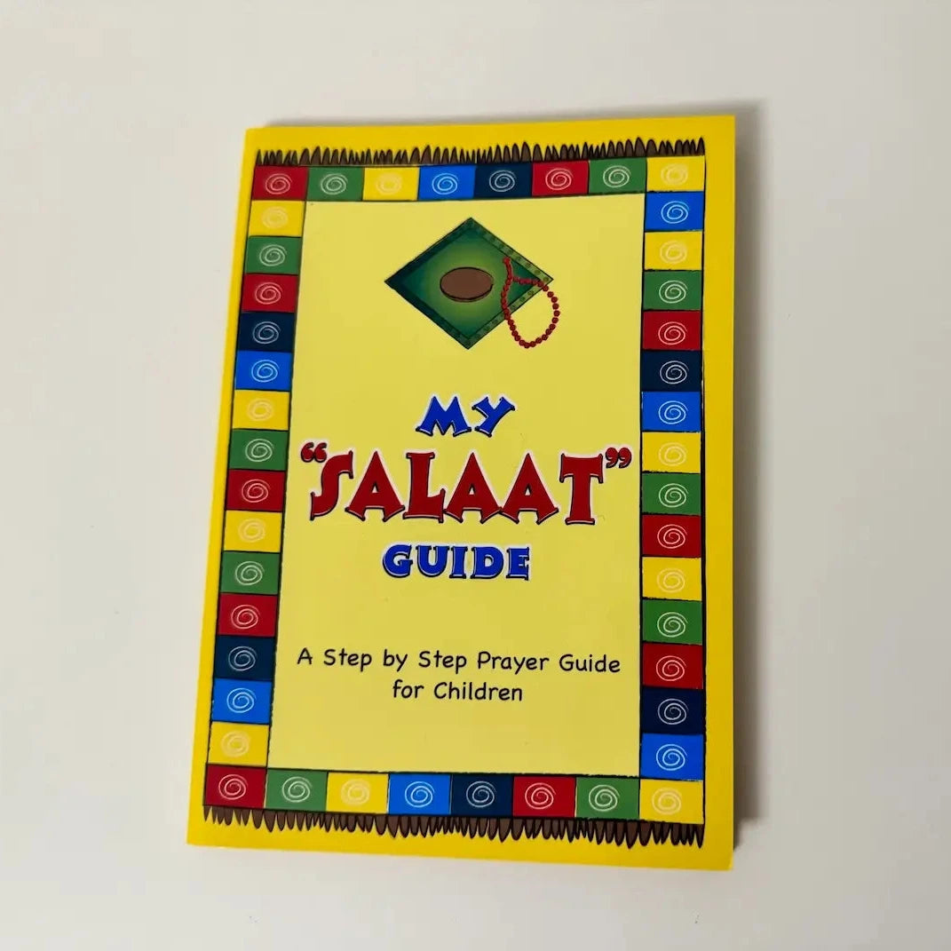 Colorful book titled 'My Salaat Guide' on a plain background