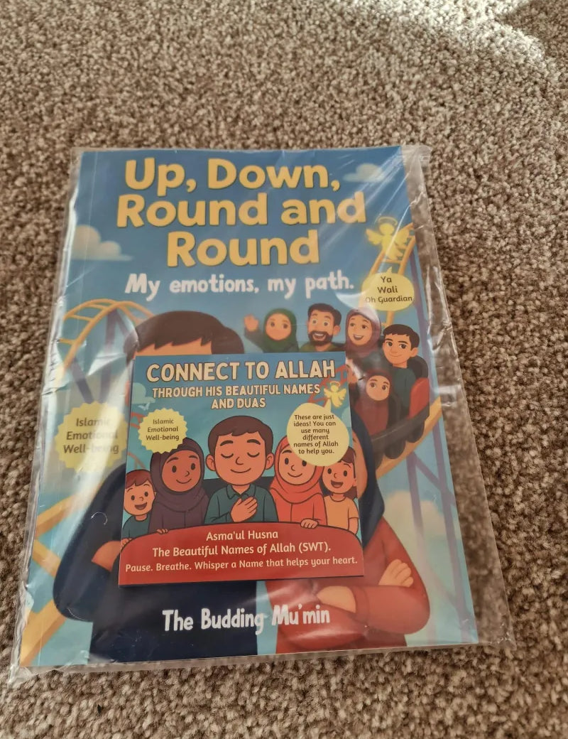Children's book titled 'Up, Down, Round and Round' on a carpeted floor.