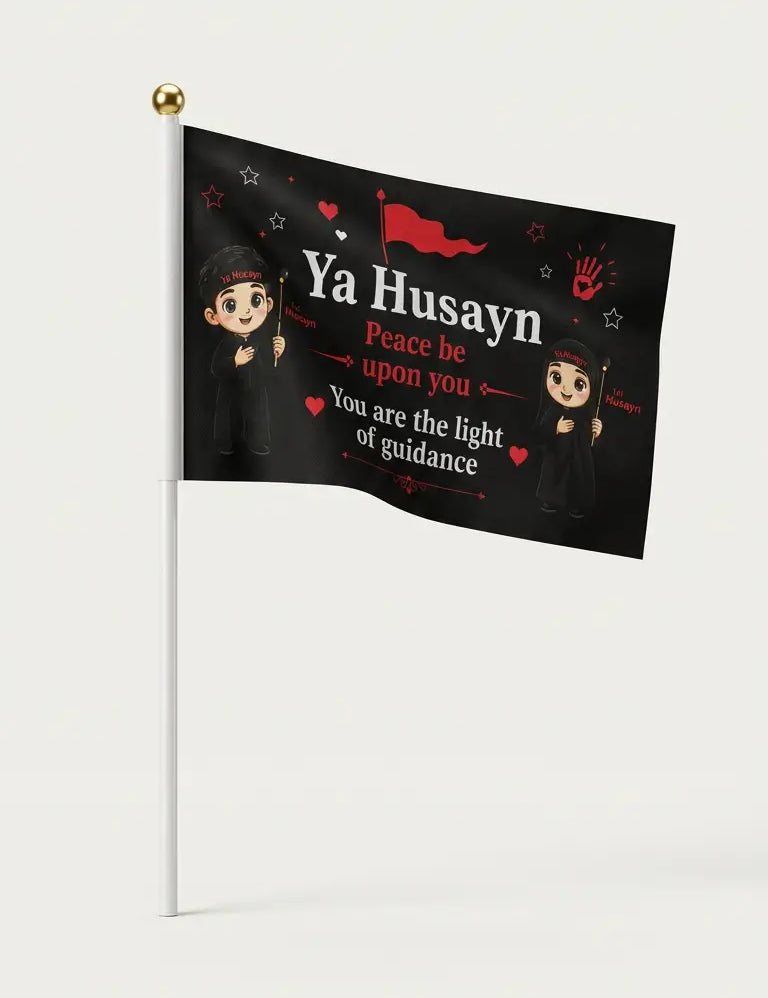 A small black flag on a white pole with a gold finial, printed with cartoon child figures, red hearts, and the text 'Ya Husayn Peace be upon you You are the light of guidance' on a light gray background.
