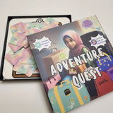 Children's game titled 'Adventure Quest' by Budding Mumin with colourful cover on a white surface with a book
