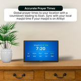 Ahlbyt Portal showing prayer times on a wooden table with a plant in the background