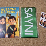Book titled 'Husayni Helpers' with a green sash and stickers on a brown carpet.