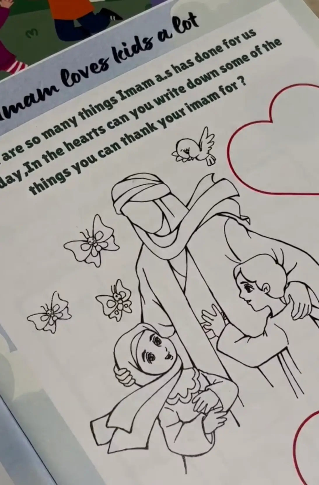 Black and white illustration of a family with children, surrounded by butterflies, on a piece of paper with text.