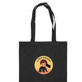 Black tote bag with "Little Azadar" featuring a child and text, on a white background.