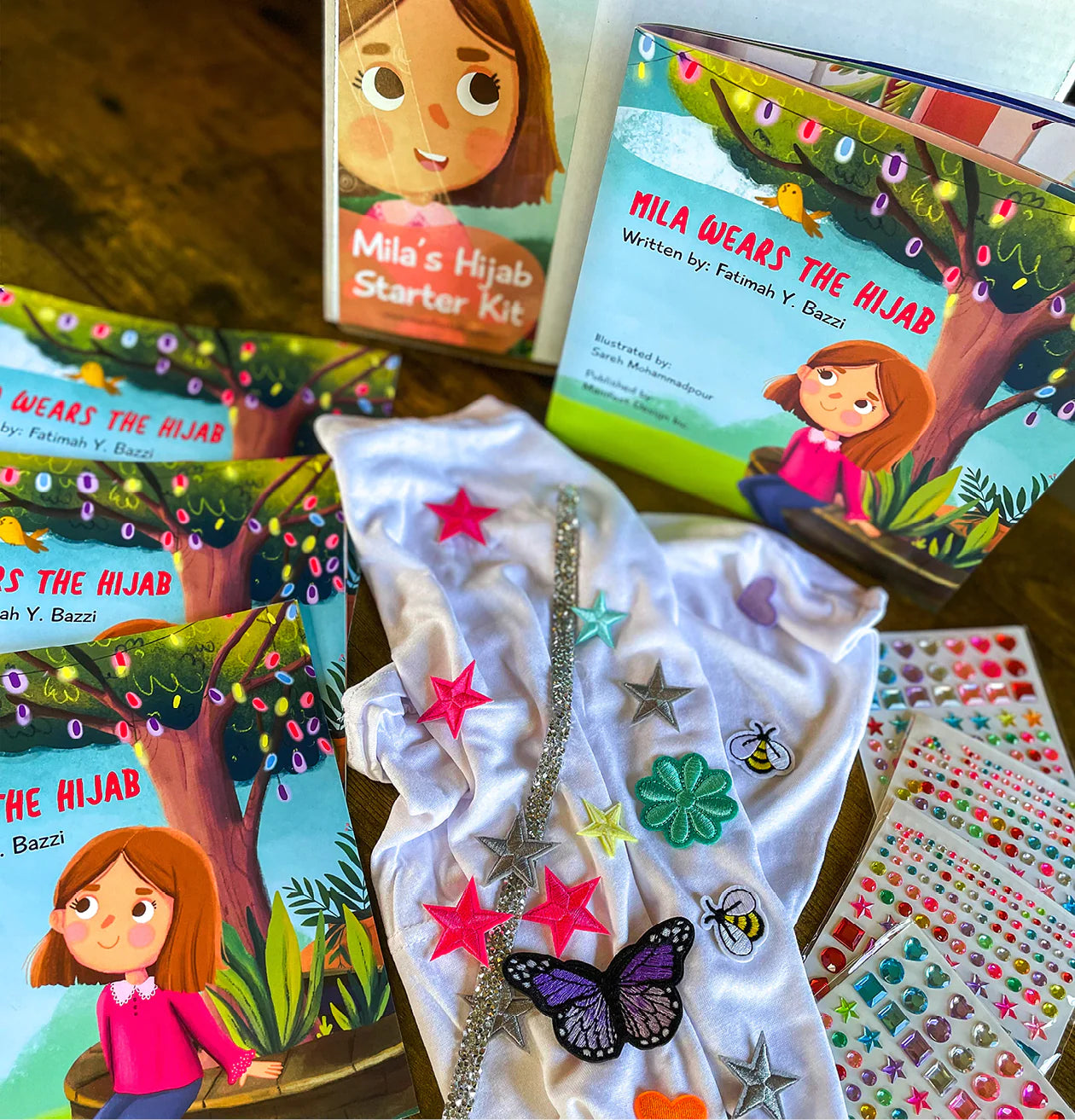 Inside of the starter kit for young girls pre-hijab. With stickers and hijab