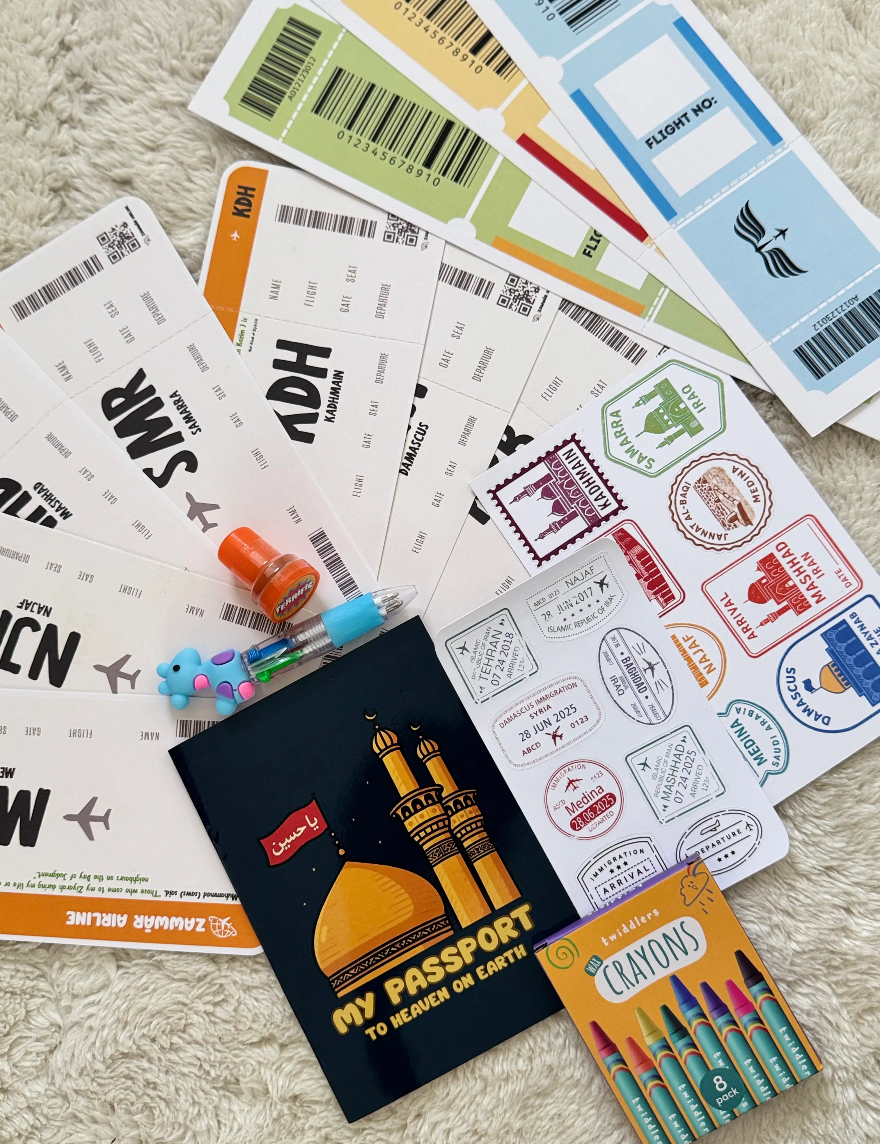 Collection of Ziyara-themed items including a passport book, stamps, and tickets on a textured surface.