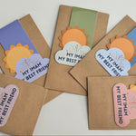 A collection of colorful magnetic bookmarks with the text 'My Imam My Best Friend' and a sun behind a cloud design.
