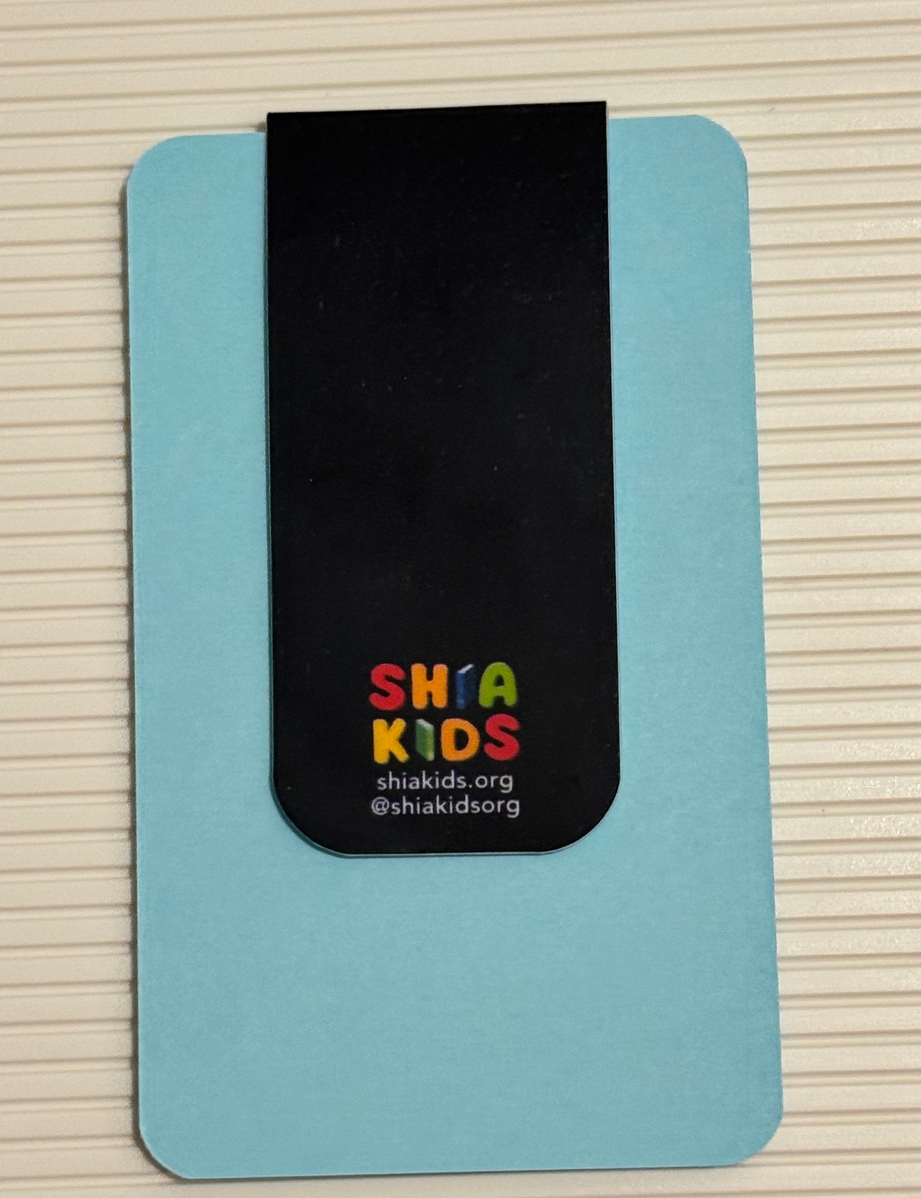 Magnetic bookmark with colorful text on a light blue card against a striped background. Perfect Islamic gift
